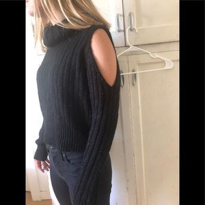 Black open shoulder turtle neck sweater